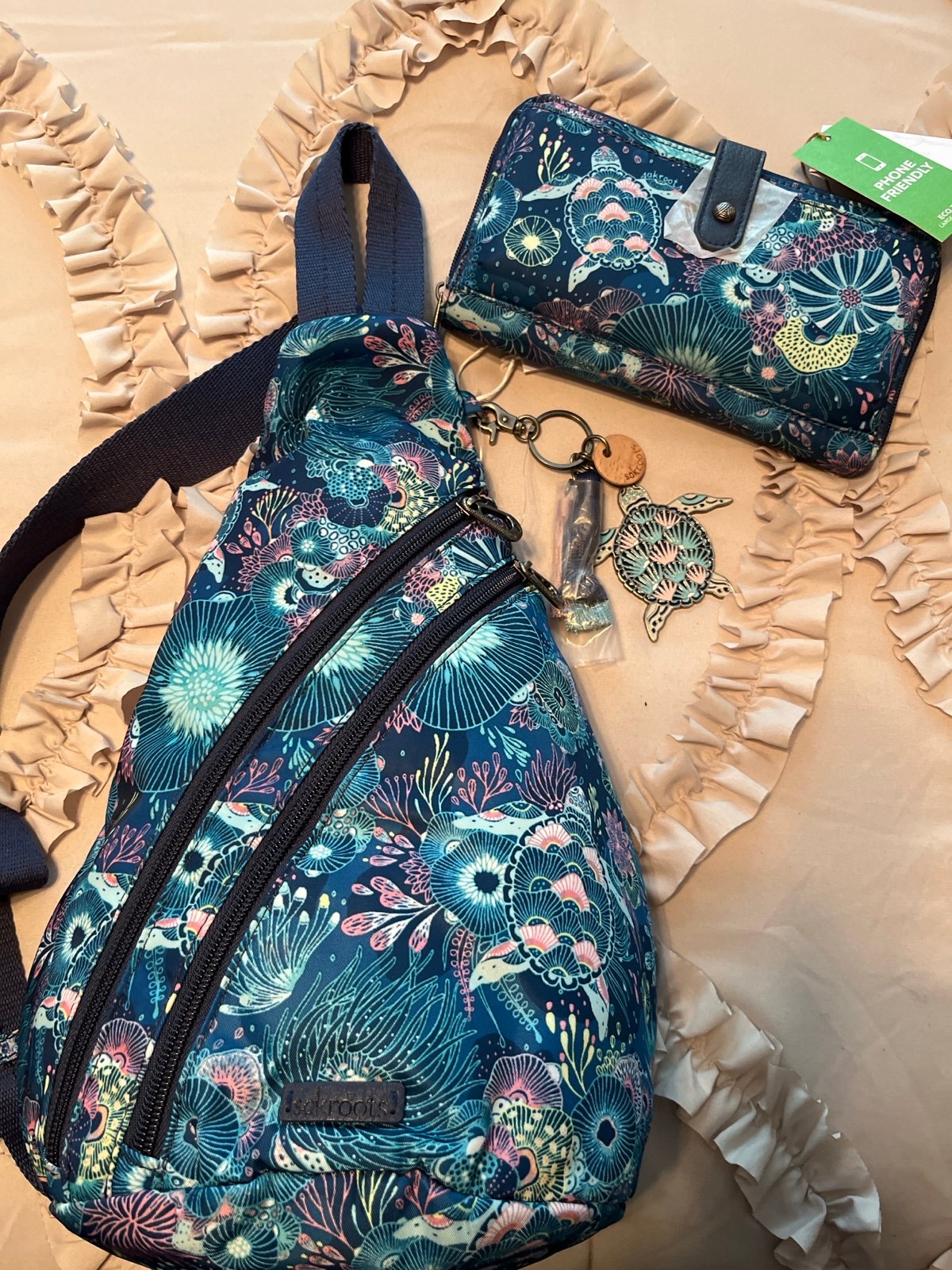 Sakroots ocean turtle sling bag and wallet