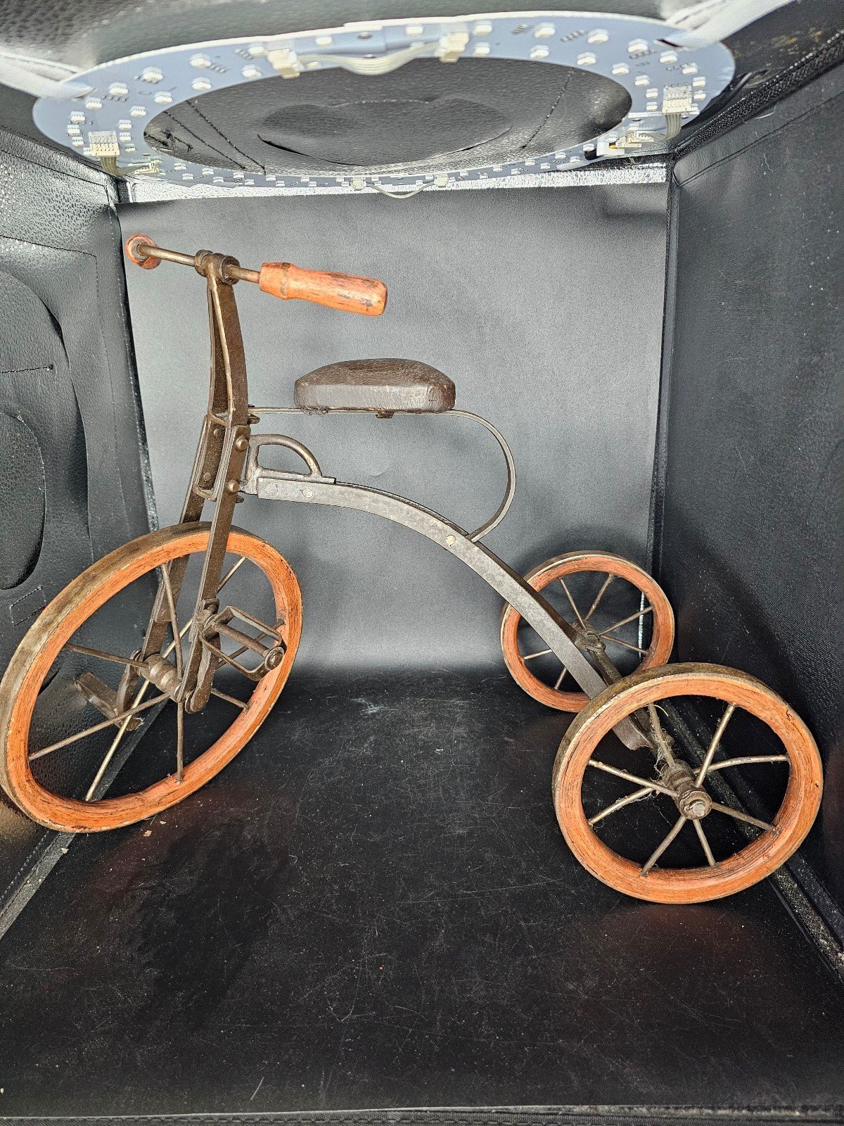 Antique cast iron and wood tricycle
