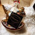 Polonaise Santa on Rocking Horse ornament.