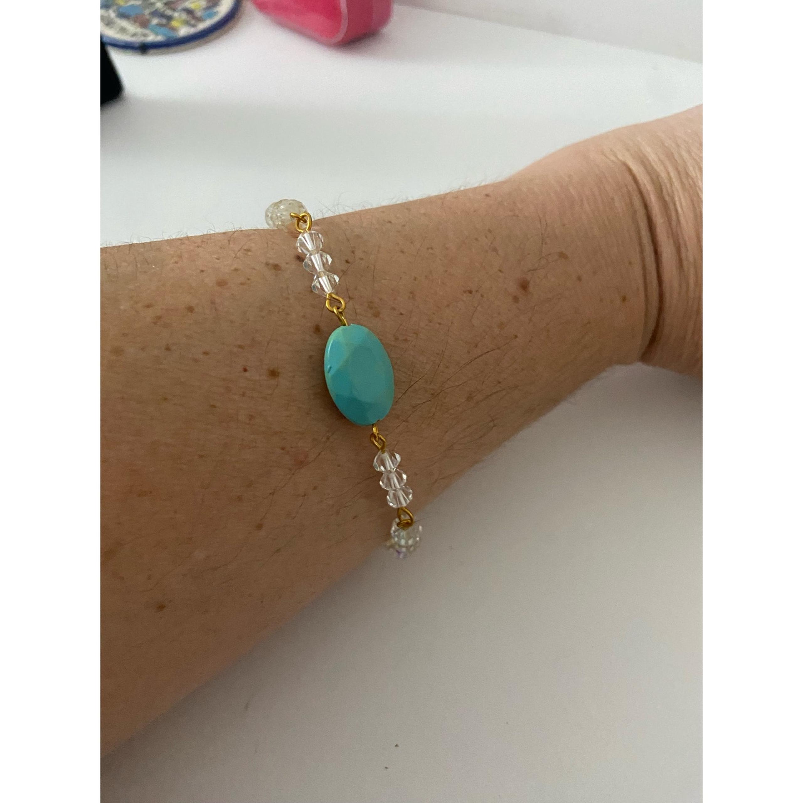 glass and blue bead bracelet
