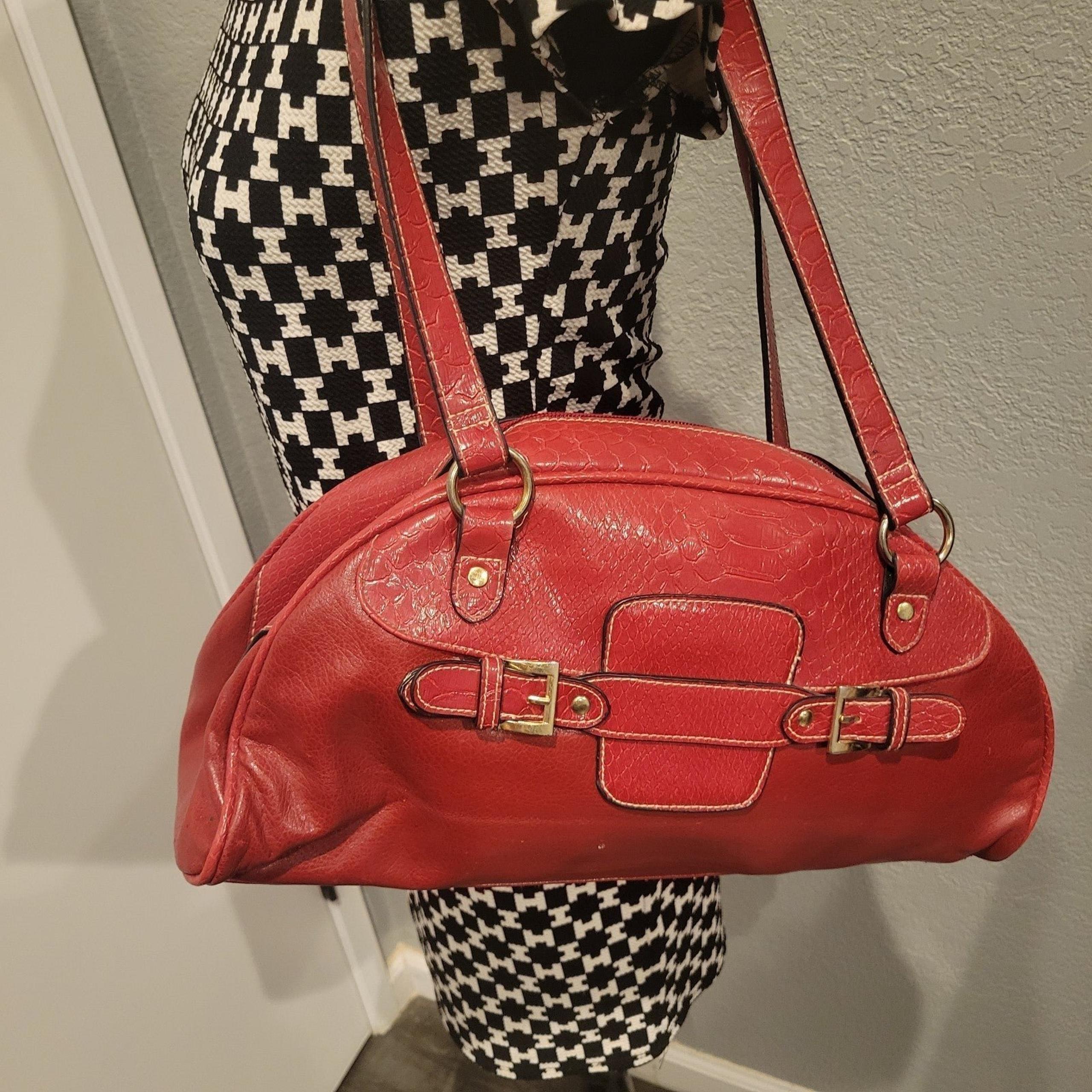 Red embossed handbag