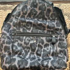 Michael kors leopard backpack purse.