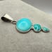 Charles Albert Sterling Silver and Turquoise Colored Gemstone Pendant