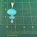 Charles Albert Sterling Silver and Turquoise Colored Gemstone Pendant