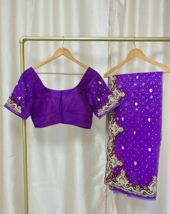 Purple Heavy Embellished Net Saree with Blouse