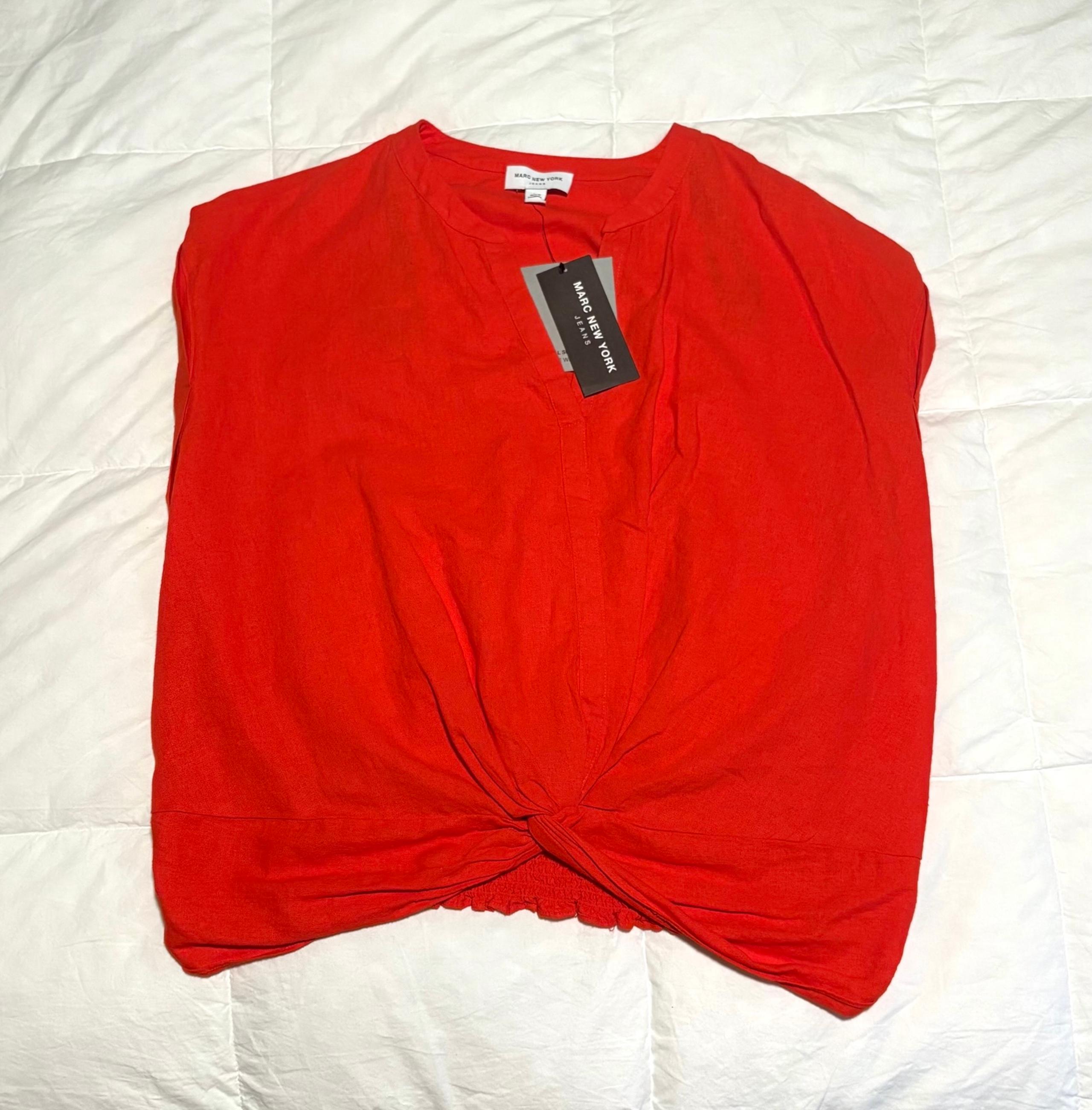 Mark New York top