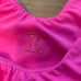 Solid pink sized labeled leotards