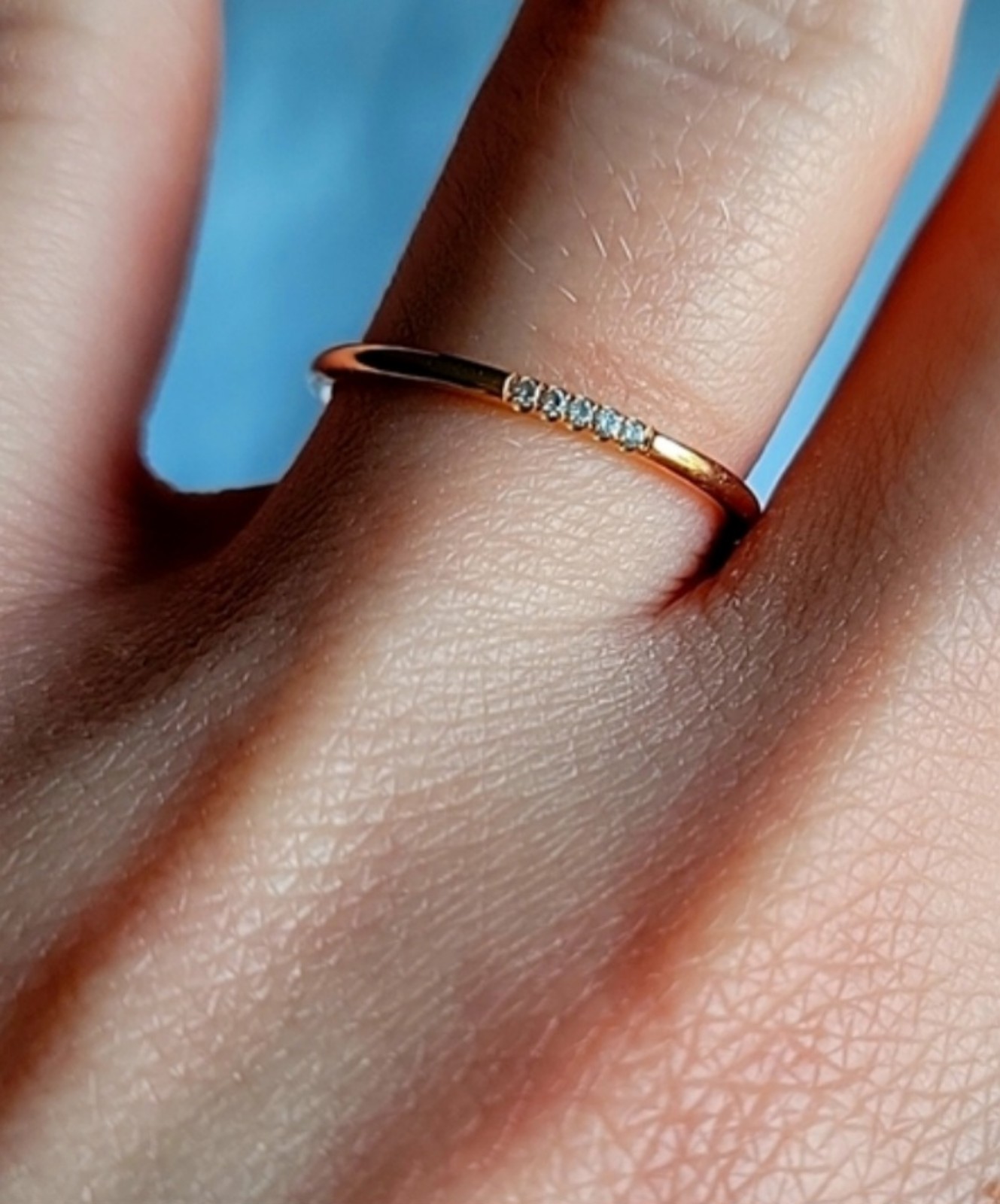 Delicate Gold and Diamond Wedding Band