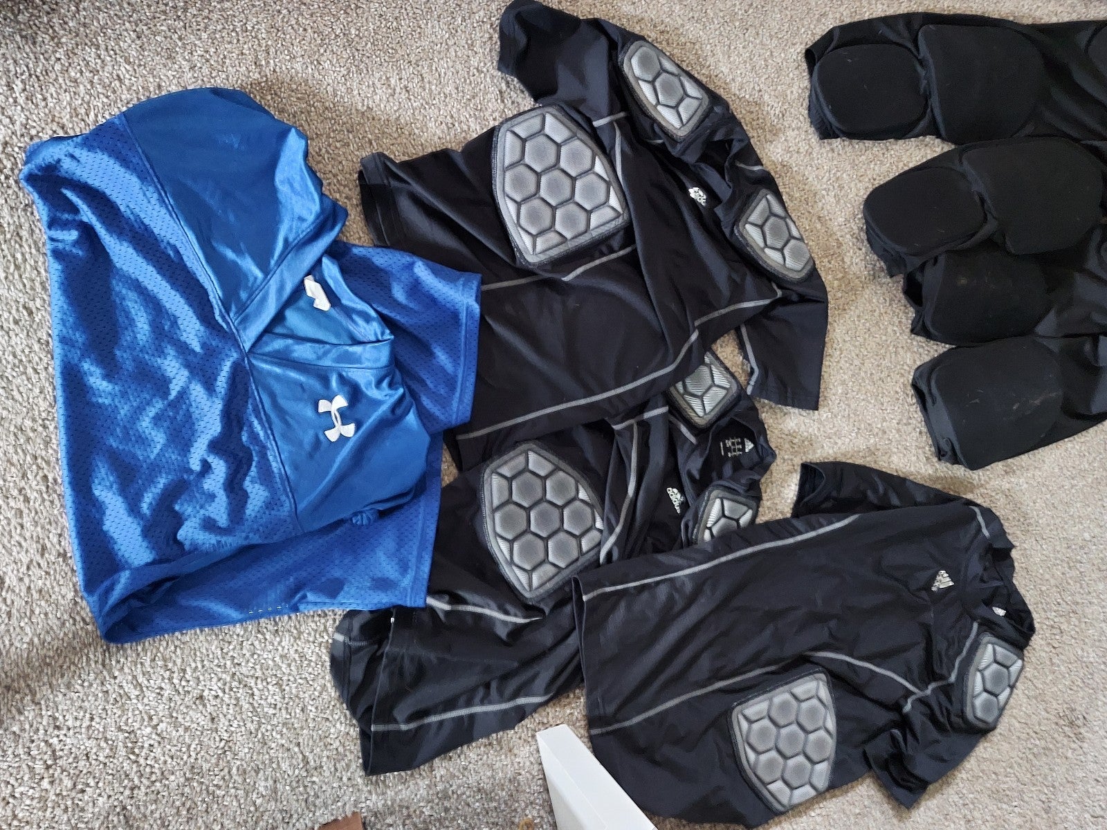 Youth football gear. Pants med and large. Tops large and xlarge.