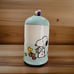 Peanuts Snoopy & Woodstock EASTER Cookie Jar/Canister Light Blue and White w/Lid