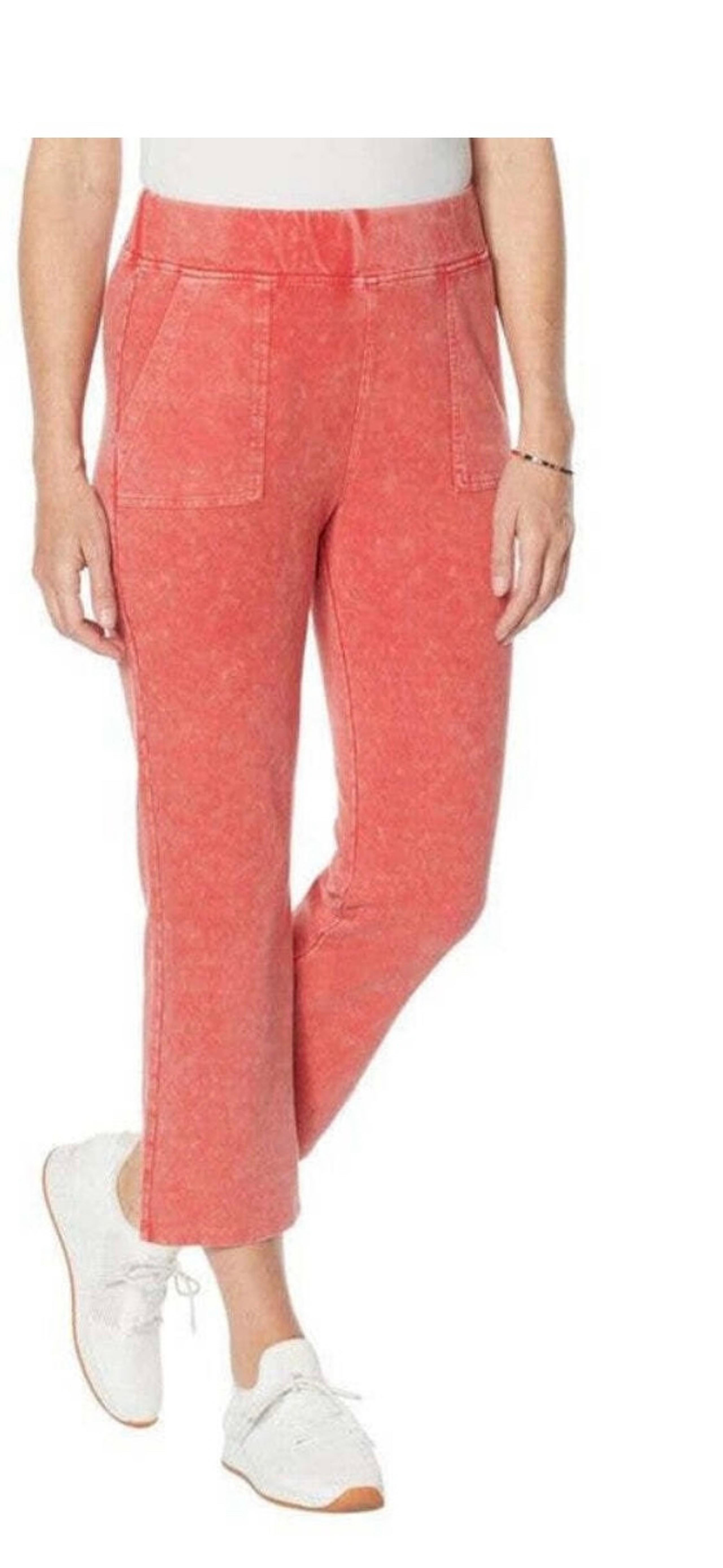 Stylish coral track pants by DC. Comfortable fit with front pockets. Perfect for