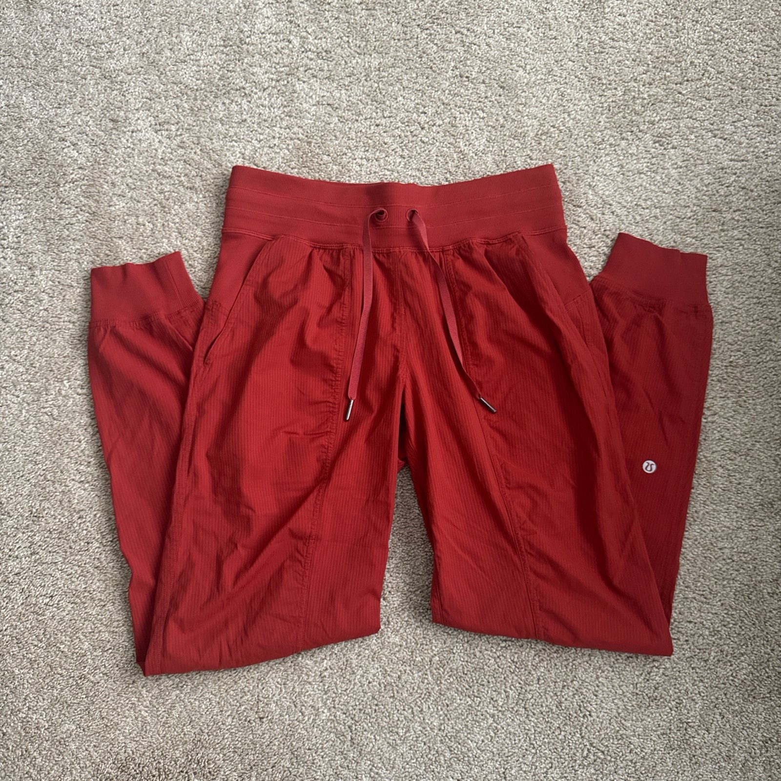 Orange Lululemon dance studio joggers