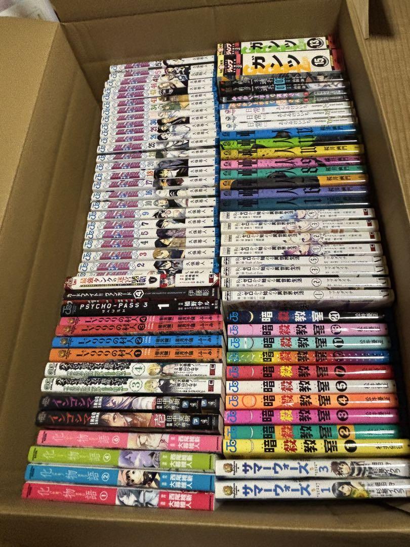 A set of many volumes of shonen manga.