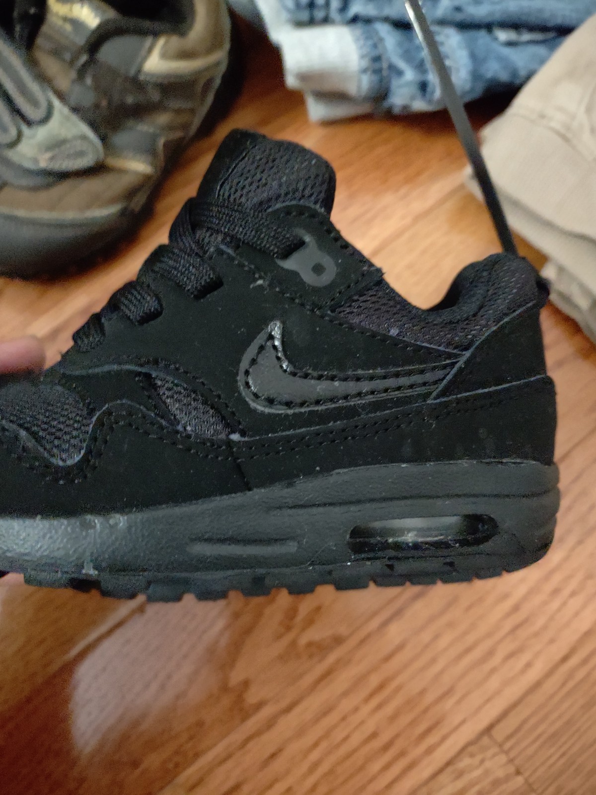 Toddler boy black Nike tennis shoes