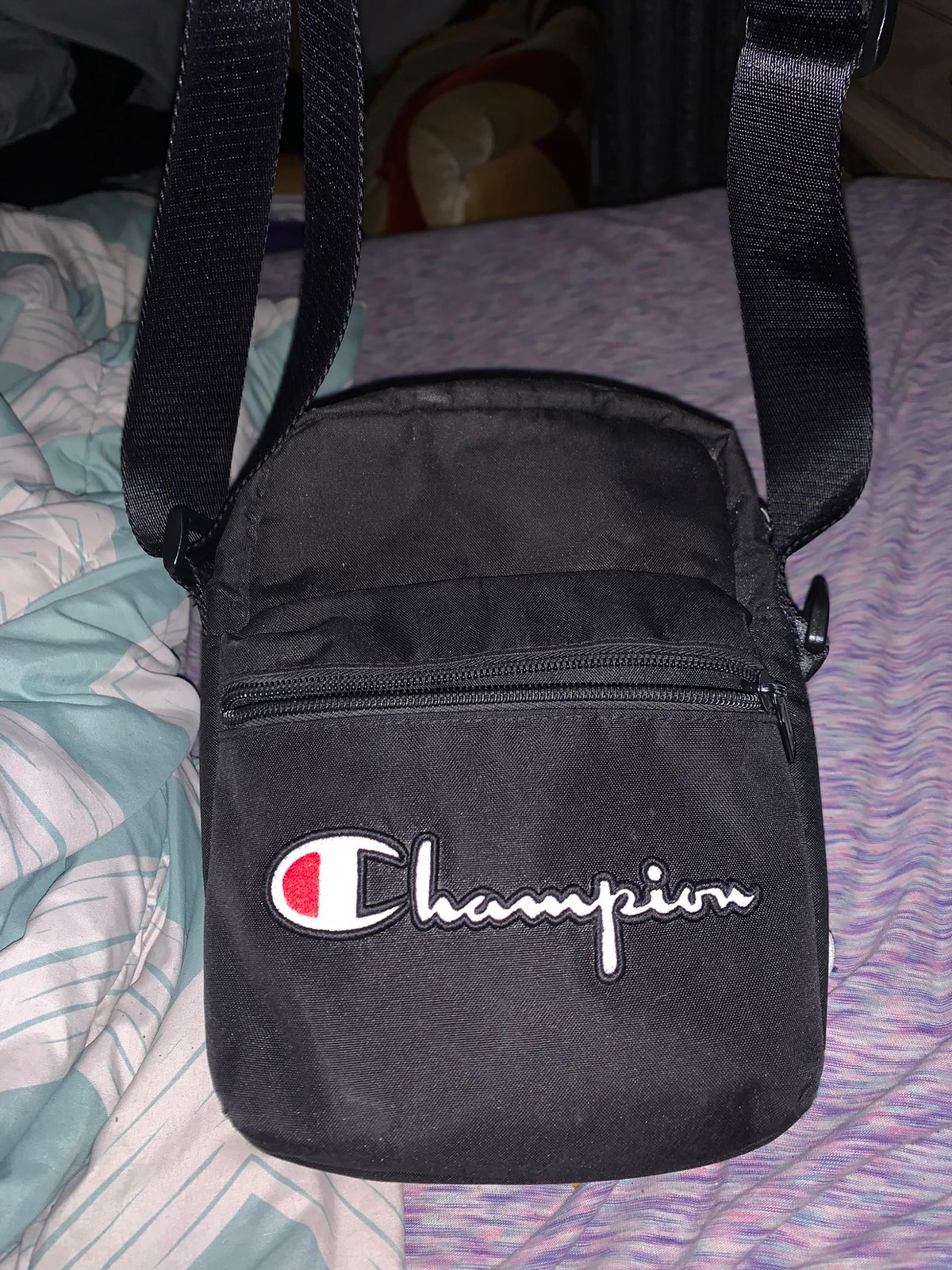 Champion black crossbody bags