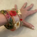 VINTAGE 1970's LUCITE BANGLES W/ ENCASED COLORFUL DRIED FLOWERS-FLOWER POWER!!!