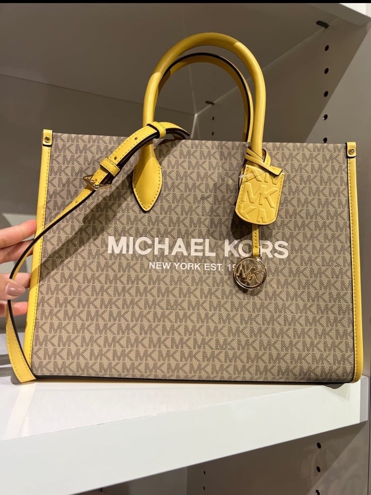 Michael Kors yellow tote bags