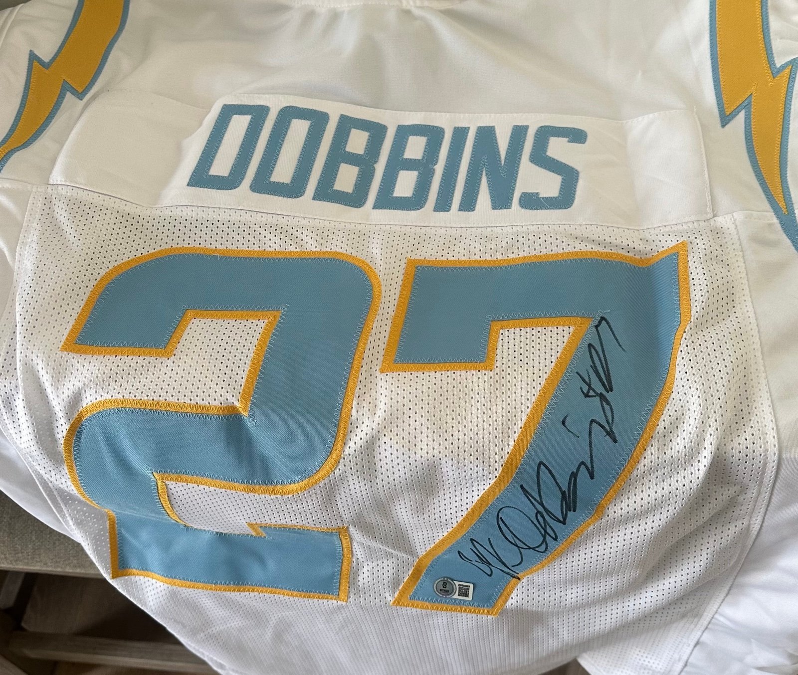 JK Dobbins Autographed Jersey Authenticated by Beckett.
