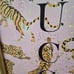 Gucci cheetah wall art